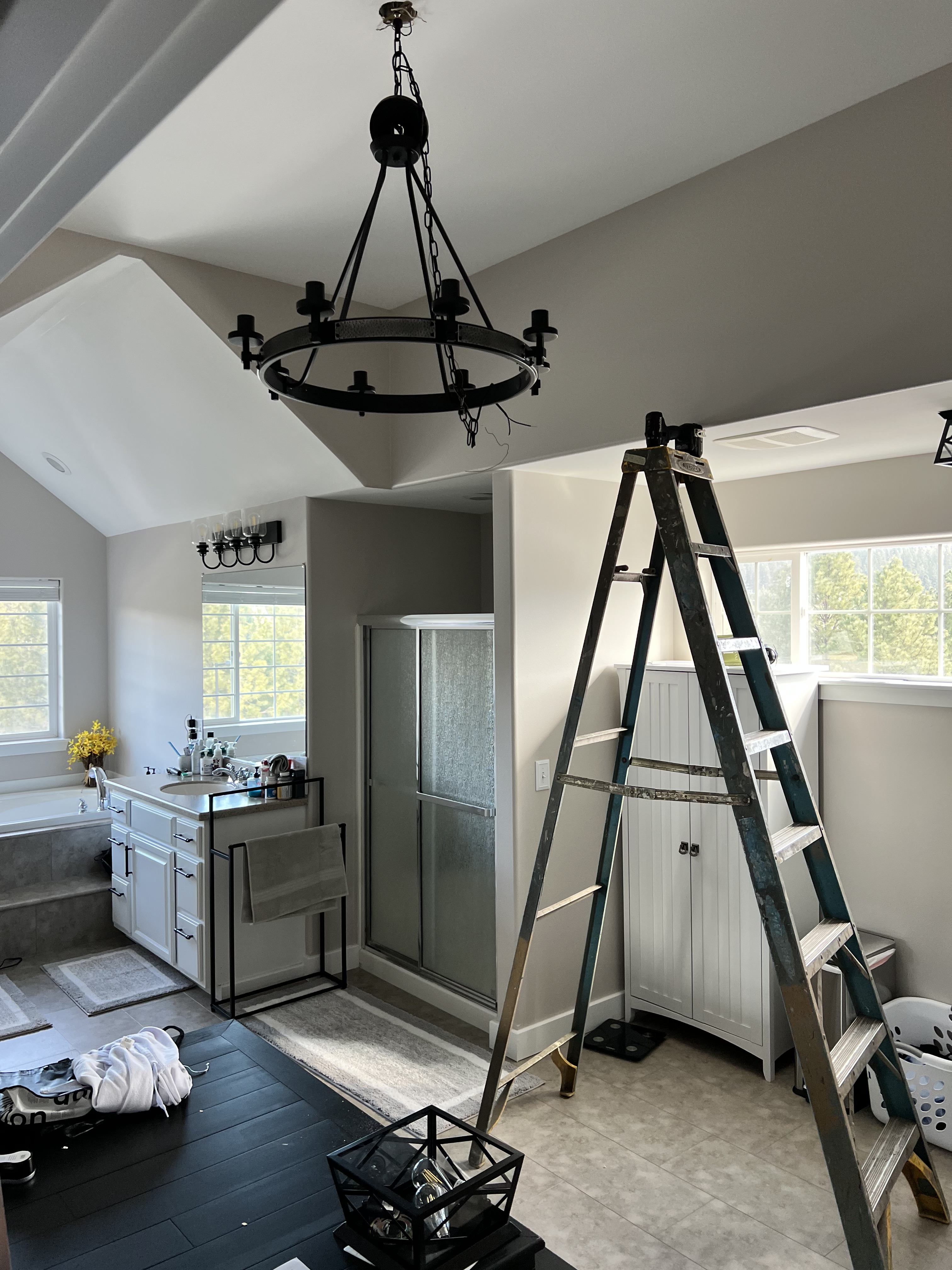 Before Remodel: Small dark shower in master bath in Liberty Lake, WA